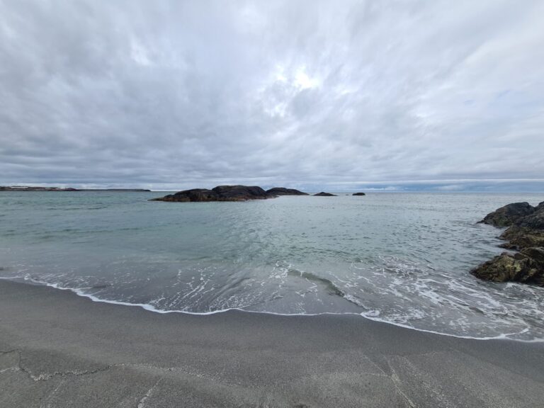 Looking on to a beach in Norway considering a career change